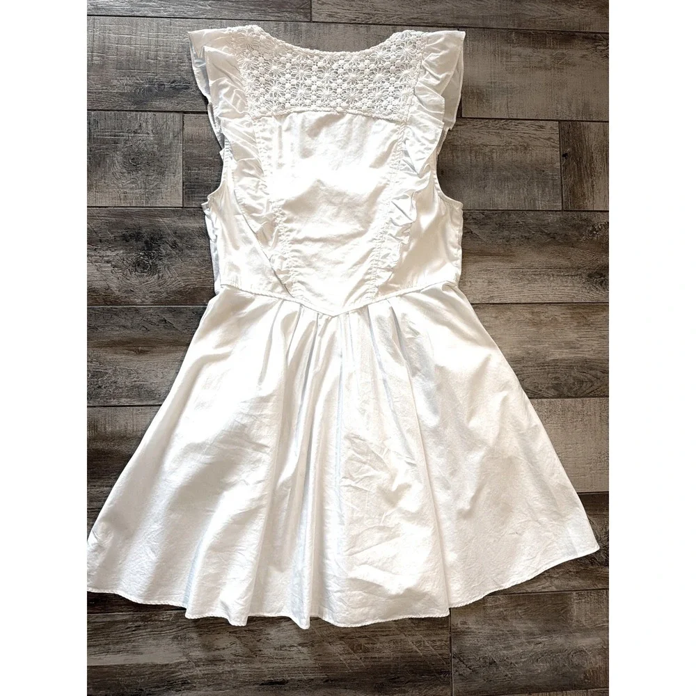 FREE PEOPLE Womens sz Large Half Moon white crochet ruffled fit & flare  pockets